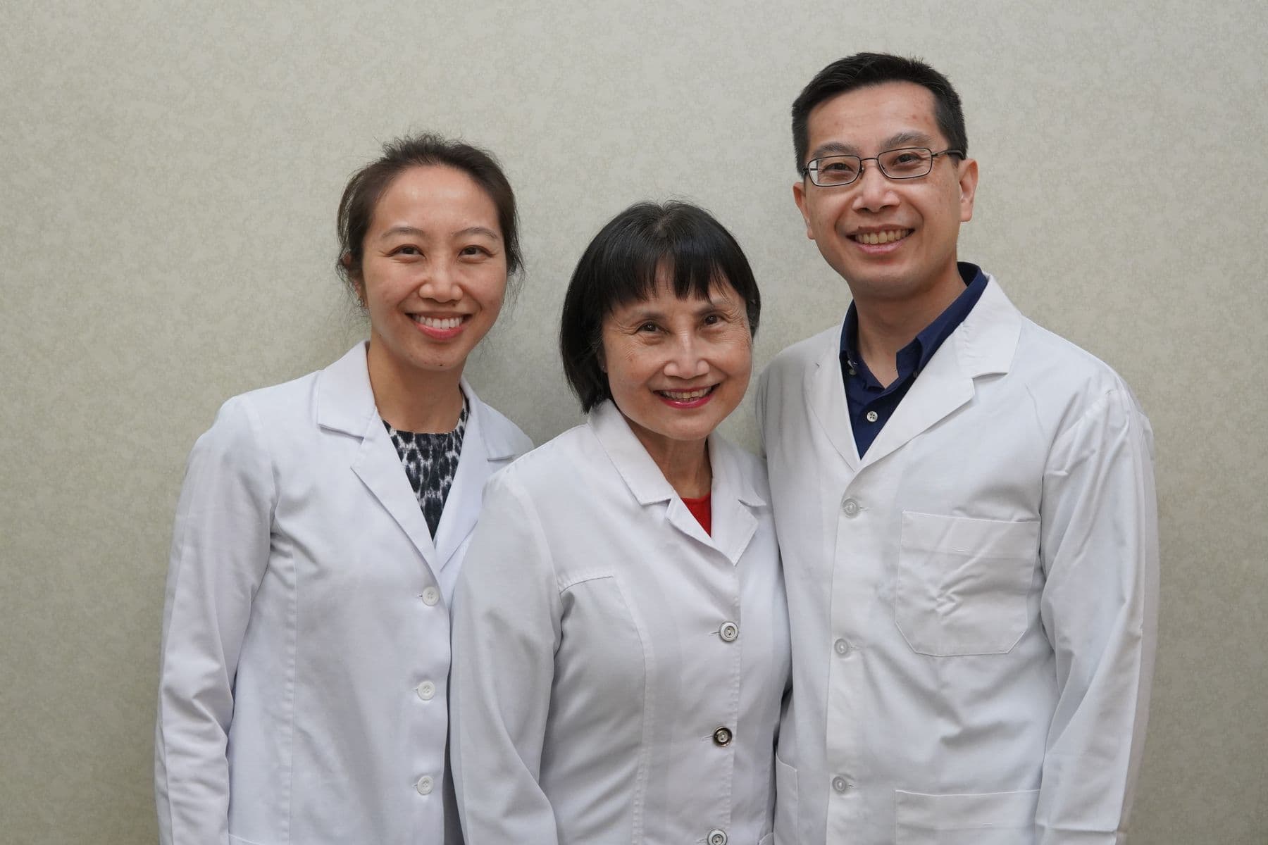 Dr. Kirsten Lee, Dr. Agnes Chan and Dr. Andrew Lee — the family of dentists at Langley Family Dentist.